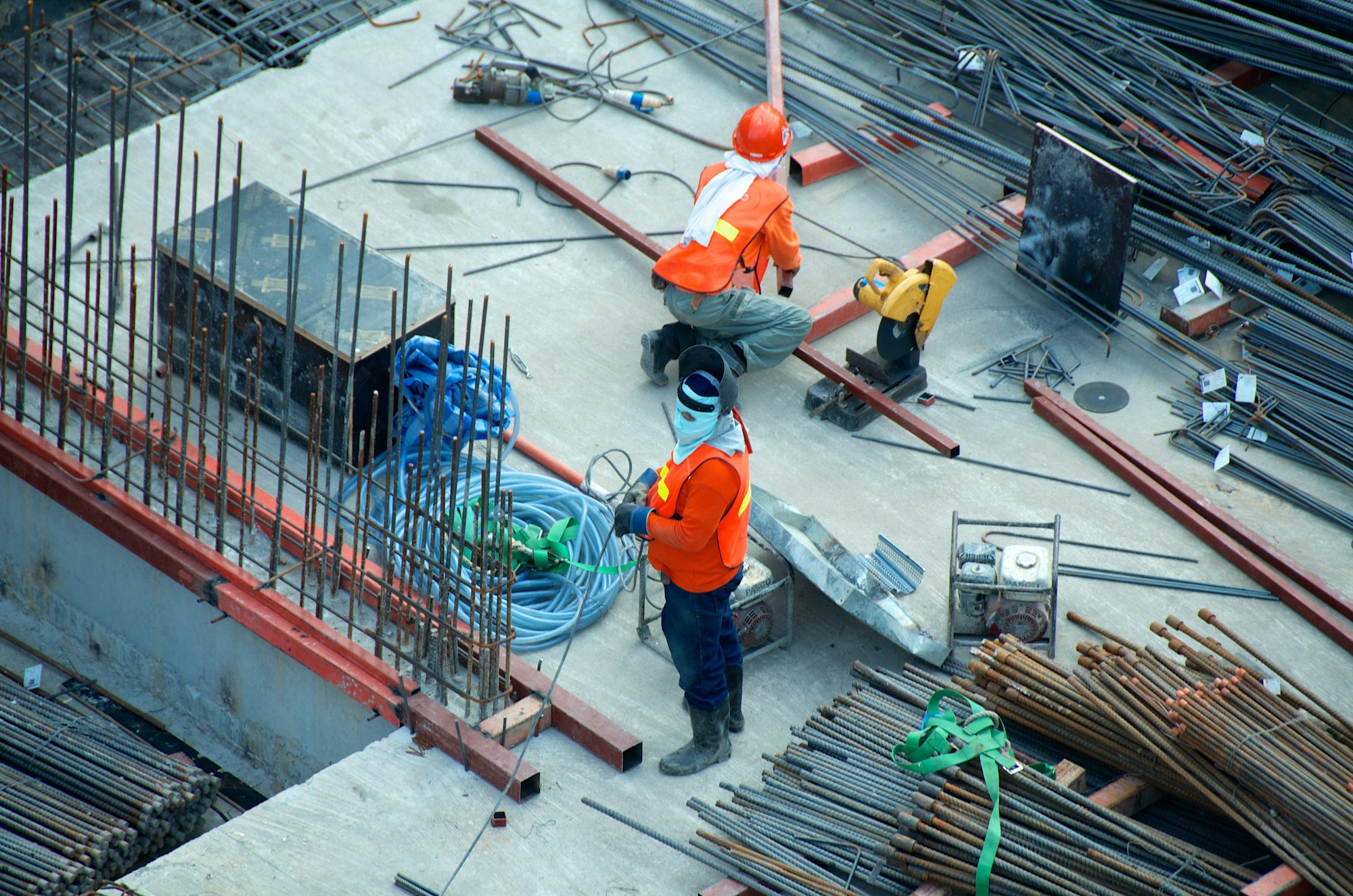 Steel frame of a building under construction against a clear sky